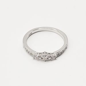 Emerald Cut Engagement Ring with Round Cut Accents